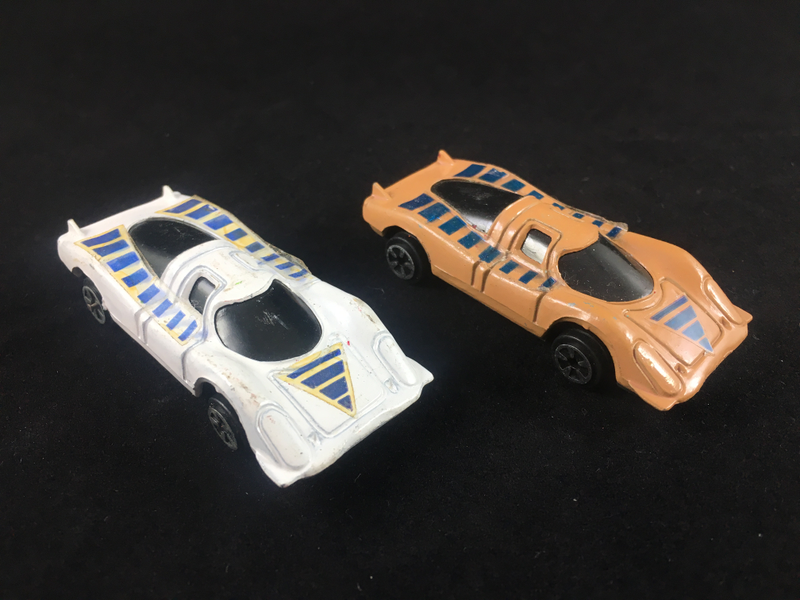 1969 Porsche 917: Unknown Hong Kong manufacture. Original 917 bodywork. No interior, the windshield is solid black. Very poor diecast quality, especially around the wheel wells.